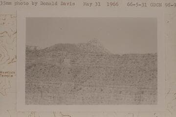 Osiris Temple looking east from saddle between main and north summits of Ra. The light grey slope in upper center and to left of the summit block is a shattered mass of Kaibab and/or Toroweap
