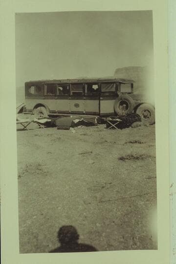 Bus and sleeping gear at Marble Canyon Bridge dedication. Print from Freeman collection