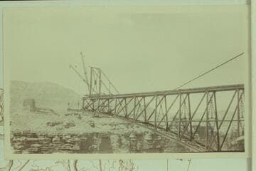 Marble Canyon Bridge under construction. The work on the bridge started August of 1927 and was completed January of 1929. Print from Freeman collection