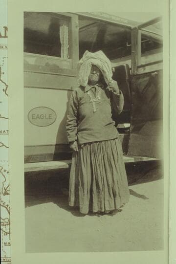 Squaw pictured by the bus between Grand Canyon and Navajo Bridge at time of the Bridge dedication. Print from Freeman collection
