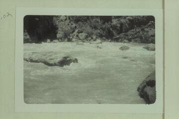 Bill Davis in No Name Rapid or Harp Rapid in Lodore. Probably Mile 233.1. From left bank