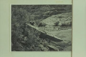 The "Illinois Girl" found on the upper Green River. She had been abandoned by Tony Backus. Holmstrom examines the wreck