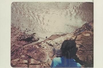 Badger Creek Rapid. Susie Reilly is the observer
