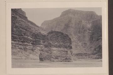 Monolith of lava in river. Grand Canyon. Lava Pinnacle, Nigger Head, Vulcans Anvil a mile above Lava Falls. Approximately Mile 178 1/2