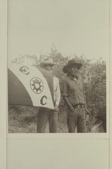 Tom Daly at the serious business of holding the flag. Tobe Owl-Nasja Begay beyond Tom. Middle fork of 73