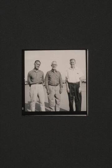 Ballard Atherton with two men