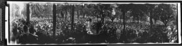 Large audience at an outdoor ceremony