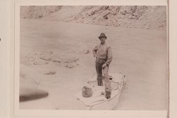 Jake Jeffs standing on the "Titanic II" at Pipe Creek. Jeffs was a member of the Russell-Tadje party for one day