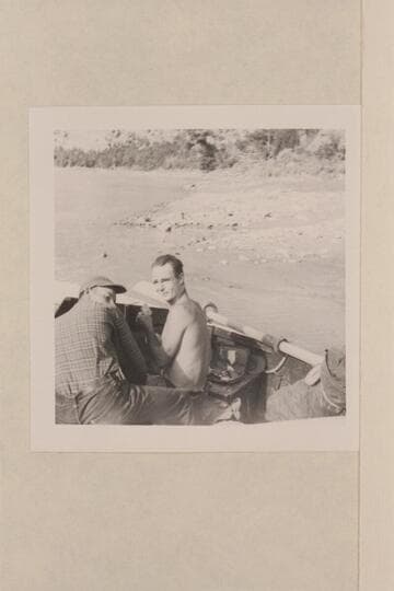 Norman Nevills in sadiron with Ken Frost; upper Green River