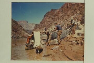 Raising the "Doris" on the right bank. Willard Wright; Duane Bishop who foundered the sadiron; Frank Wright; John Harper; Bruce Hume trying