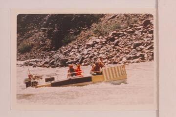 Deck Boat in Dubendorff Rapid. Jim-Bob Rowland is at the wheel. Dock Marston is piloting. Shell Wimpfen, Jim Jordan sit aft